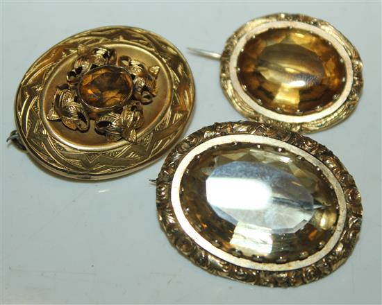 3 x citrine and gold brooches(-)